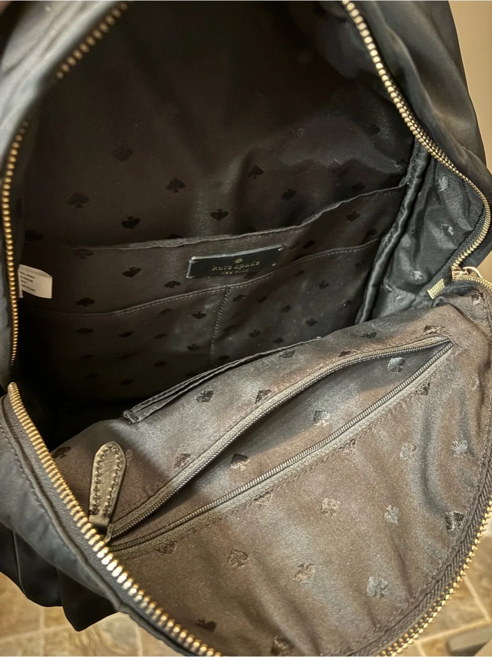 kate spade black nylon backpack with gold logo